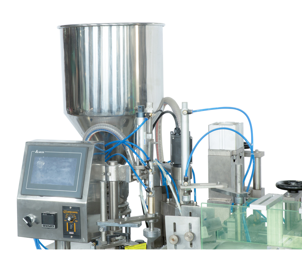 Toothpaste filling and sealing machine
